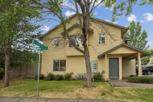 South-facing 3-bedroom townhome with covered front entry on SE Roberts Drive at Roberts Court Townhomes in Gresham, Oregon