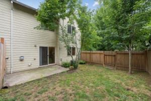 Patio and private fenced backyard at a Roberts Court townhome