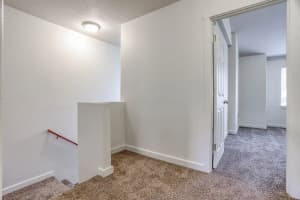 Roberts Court 3-bedroom townhome upstairs landing and bedroom hallway